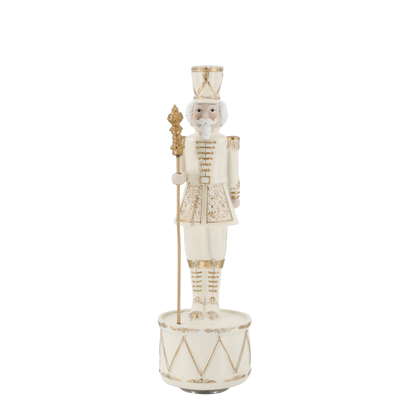 Decorative nutcracker figure with a drum on a white background