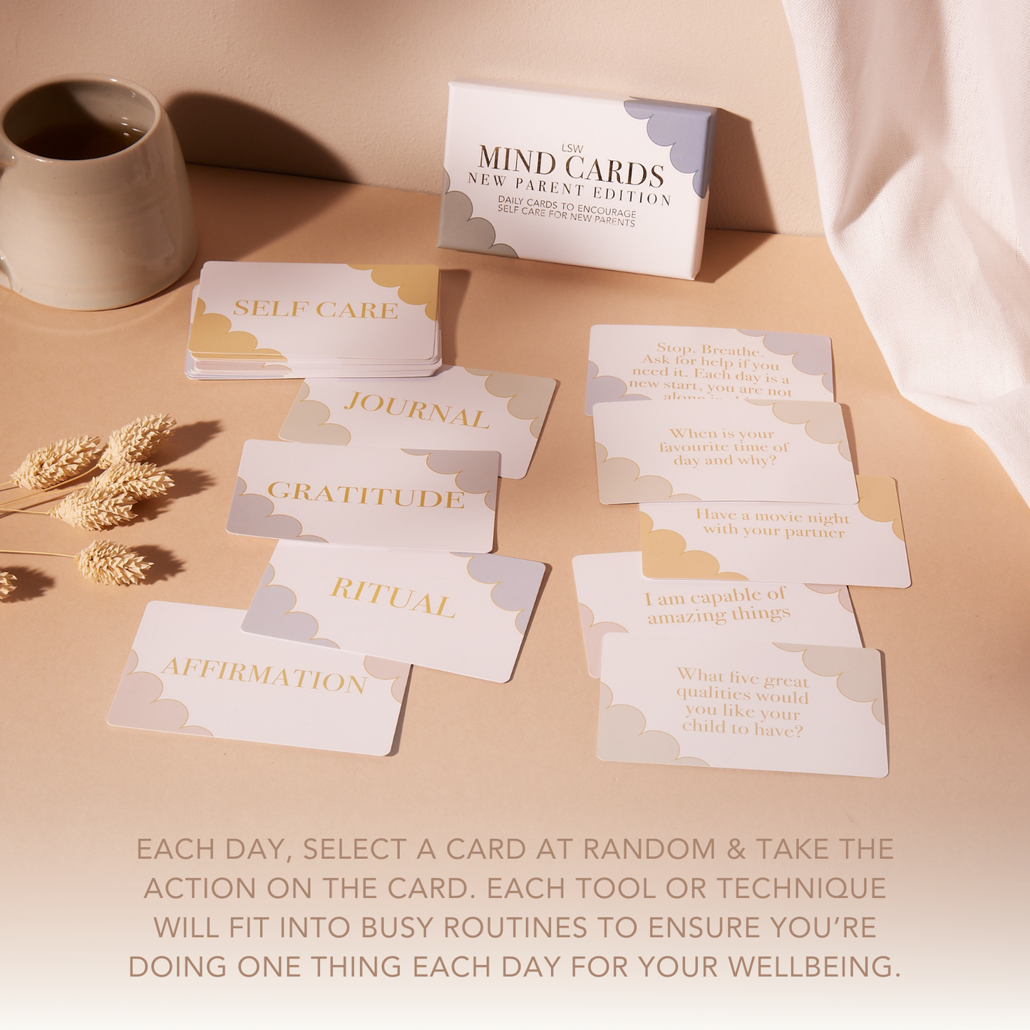 Mind cards on a table with a cup of coffee and text about self-care and journaling.