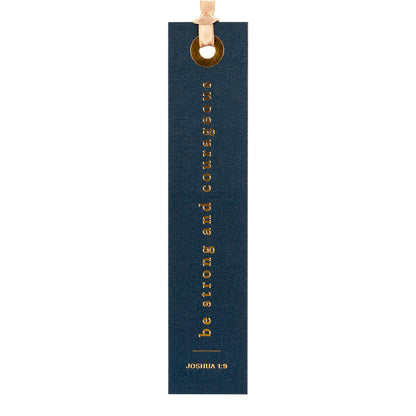 Dark blue bookmark with gold text and a wooden clip on a white background