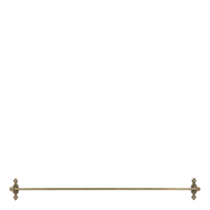 Brass towel bar with decorative ends on a white background