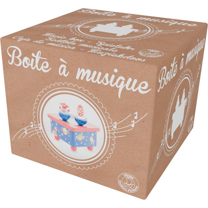 Cardboard box with musical design and text on a white background