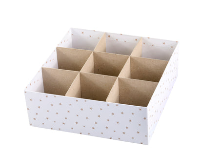 White storage box with star patterns and nine compartments on a white background