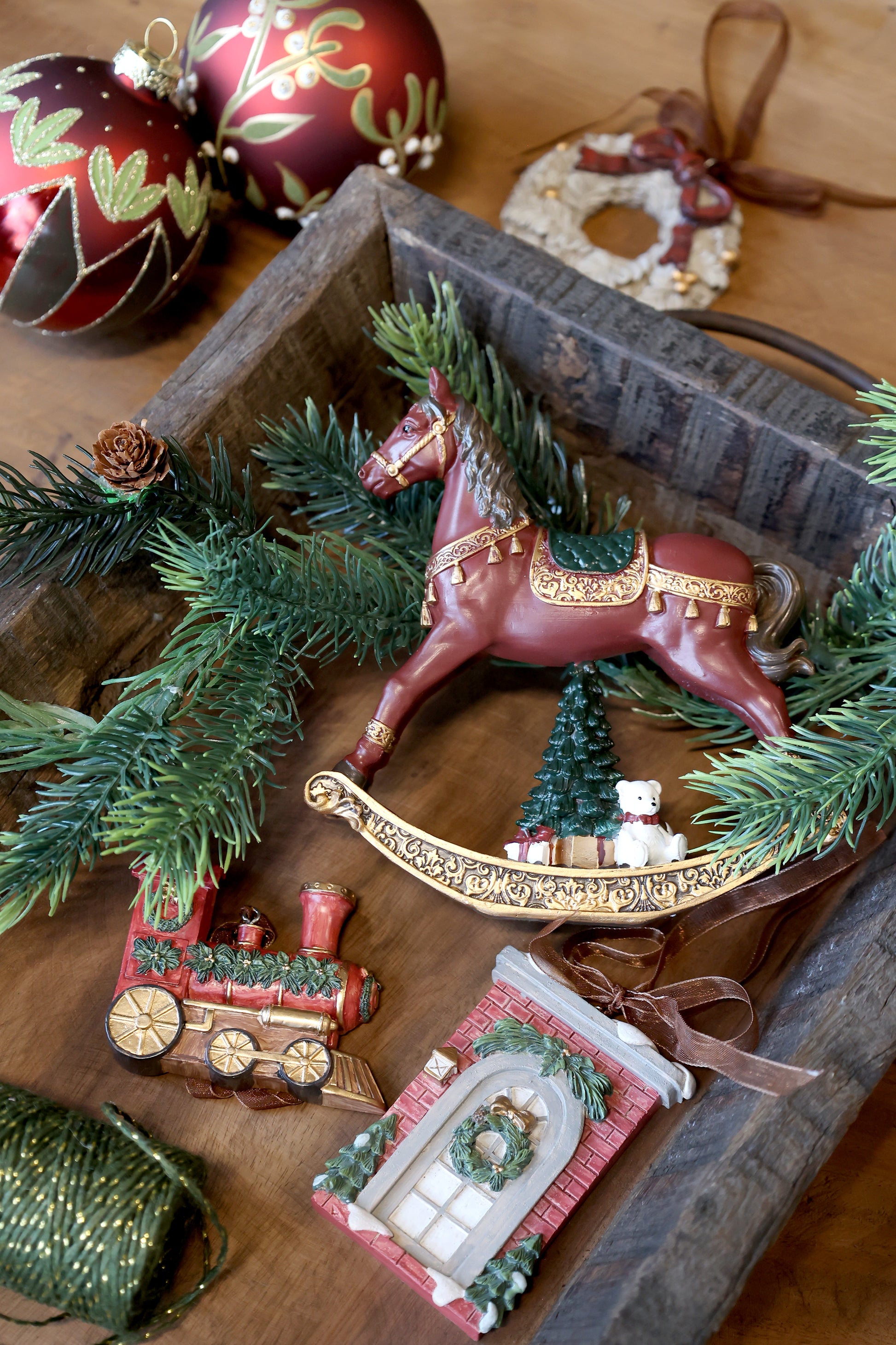 Vintage style Christmas ornaments on wooden tray. Generosa Home