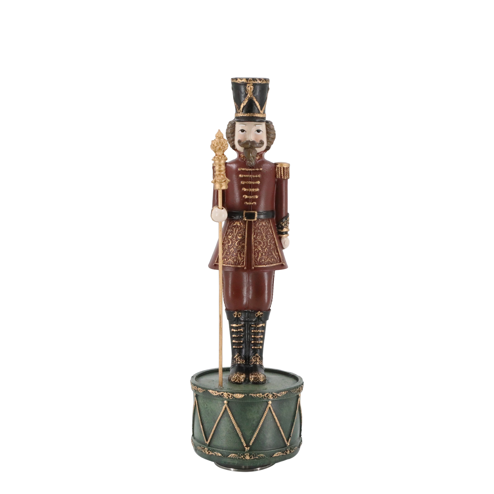 Decorative figurine of a soldier on a drum with a white background