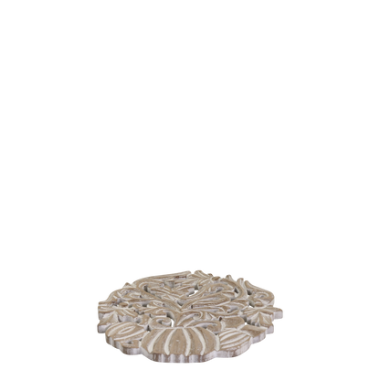 Decorative round stone with intricate patterns on a white background