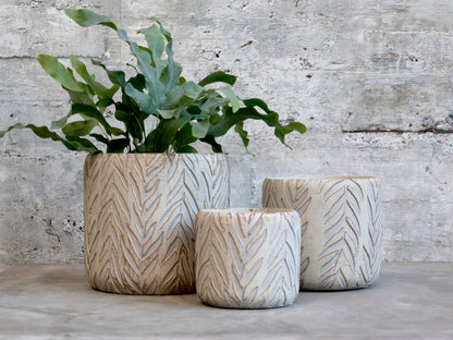 Planter with leaf pattern