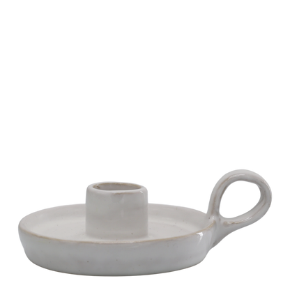 Ceramic candle holder with a handle on a white background