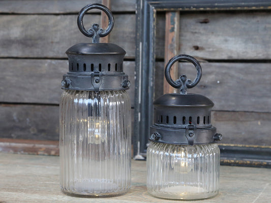 Never get caught if power goes out. These lanterns are perfect and safe for walking around a dark house. They make excellent night lights as well just adding ambiance to any room. Once turned on they will automatically shut off after 8 hours.  Material: Zinc and glass Socket: E12 Watt: 0,1 can use up to 7  Battery: 2 pcs. AA Timer: 8 hours on/16 hours off  Dimensions: H30/D11cm