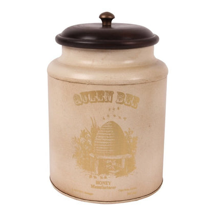 This stylish canister from Dutch Style is perfect for storing items in the home or office. Crafted with a metal body, it has a unique Baroque-style pattern and a wood top. It measures 19x13cm and makes a beautiful statement in any room.  This baroque style iron canister with wooden lid is perfect to use as a storage jar for tea, coffee, sugar or as decoration in any other room of the house.- Generosa